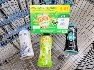 gain detergent pods with gain and downy scented beads in a cart