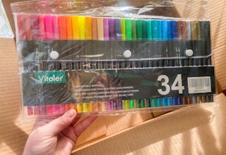 vitoler dual tip colorful marker pens in an amazon box