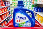 purex laundry detergent sitting on a target cart 