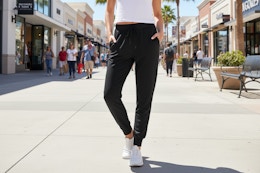 a woman wearing joggers