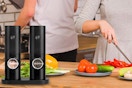 a salt and pepper grinder near a couple cooking