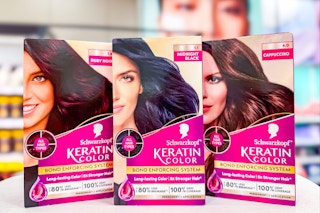 3 schwarzkopf hair color kits sitting on a target at target