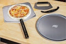 Lifestyle image of the Blackstone Pizza Kit in home setting with a raw pizza 