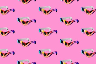Several pairs of solar glasses lined up in rows.