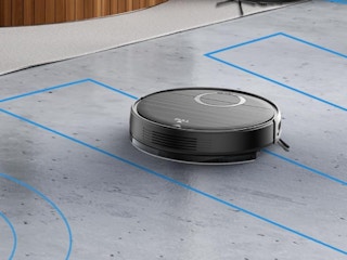 a robot vacuum and mop on a floor