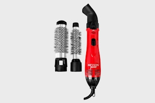 a red hot air hair brush
