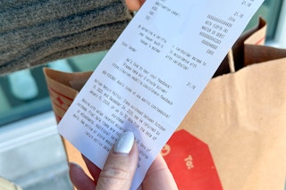an old navy receipt being held