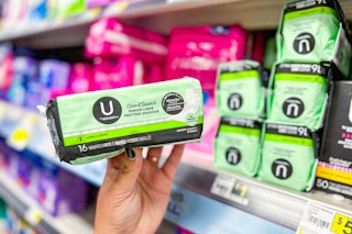 hand holding a pack of u by kotex liners