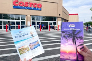 costco travel brochures on being held in front of store