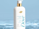 a bottle of body wash sitting in water