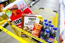 groceries in a yellow shopping cart
