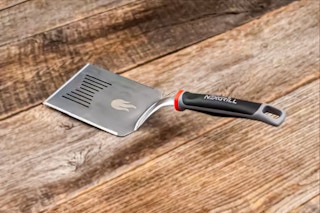 Lifestyle image of Nexgrill Spatula on wooden table