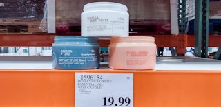 bellevue candles on a shelf at costco with sales tag