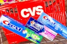 cvs basket and three tubes of crest toothpaste