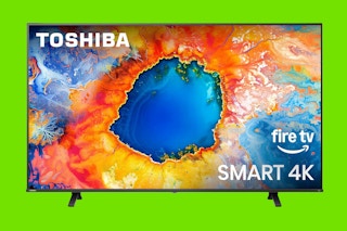a toshiba tv on a green background