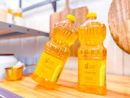 2 good & gather corn oil bottles together