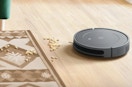 a irobot roomba cleaning the floor