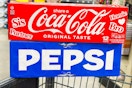 pepsi coca cola in shopping cart