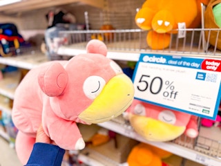 hand holding a pokemon plush at target