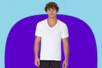 Male model wearing a white Hanes v-neck t-shirt
