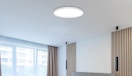 a flush mount light on a ceiling in a room