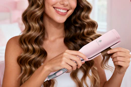 woman putting waves in her hair