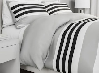 stock photo of lavish home down alternative comforter staged in bedroom