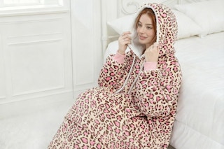 a woman wearing a wearable blanket