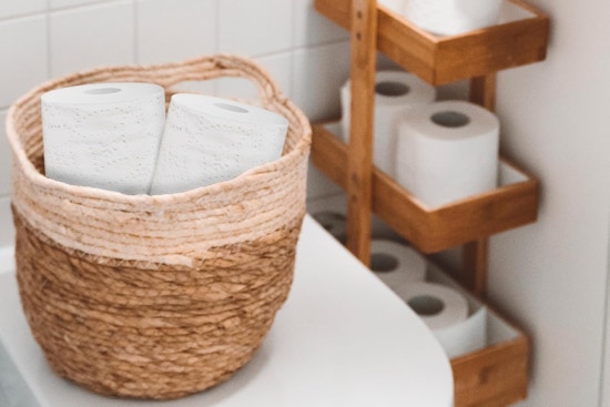 Toilet paper stuffed in basket 