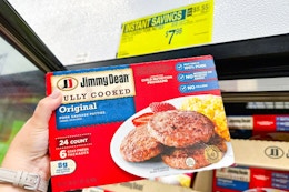 hand holding a box of jimmy dean sausage patties
