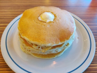 ihops full stack of pancakes with a pat of butter on the top