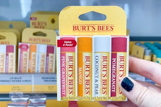 burt bees lip balm being held up in store