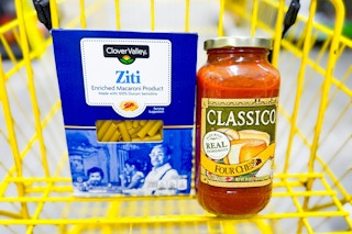 clover valley pasta and classico sauce in a yellow shopping cart