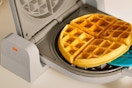 a bella waffle maker making a waffle