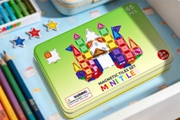 box of magnetic building blocks on desk