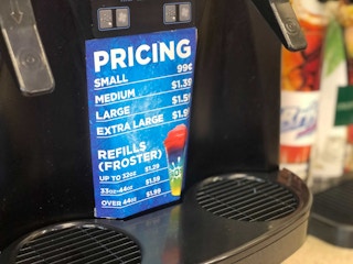 close up of the pricing for froster slushie drinks at circle k