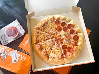 Hhalf cheese half pepperoni pizza from Little Caesar's