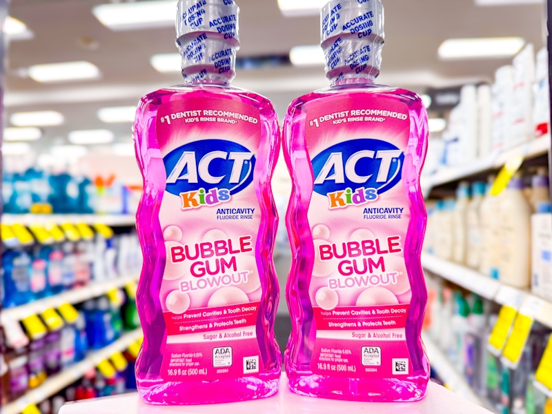 2 bottles of act kids mouthwash on a shelf