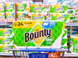 Bounty Paper Towels in Walmart shopping cart in front of the paper towel aisle 
