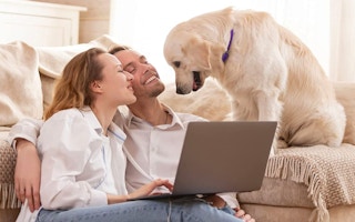 a couple with their dog