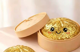 a gold squishy dumpling toy