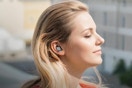 woman wearing earbuds