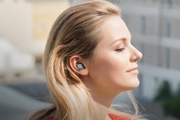 woman wearing earbuds