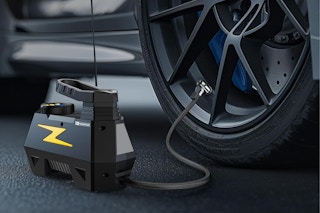 Tire Inflation Air Compressor blowing up a tire