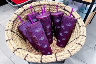 purple starbucks tumblers in a basket