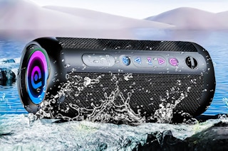 Lifestyle image of the Cascho Portable Bluetooth Speaker with water splashed on it to show that its waterproof