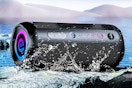 Lifestyle image of the Cascho Portable Bluetooth Speaker with water splashed on it to show that its waterproof