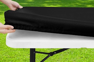 Person putting on Picnic cloth