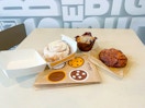 Mcdonalds bakery items, cinnamon roll with icing, blueberry muffin and an apple fritter