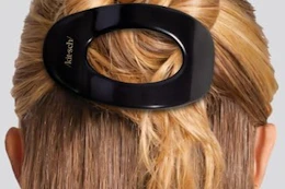 a woman wearing a kitsch hair clip